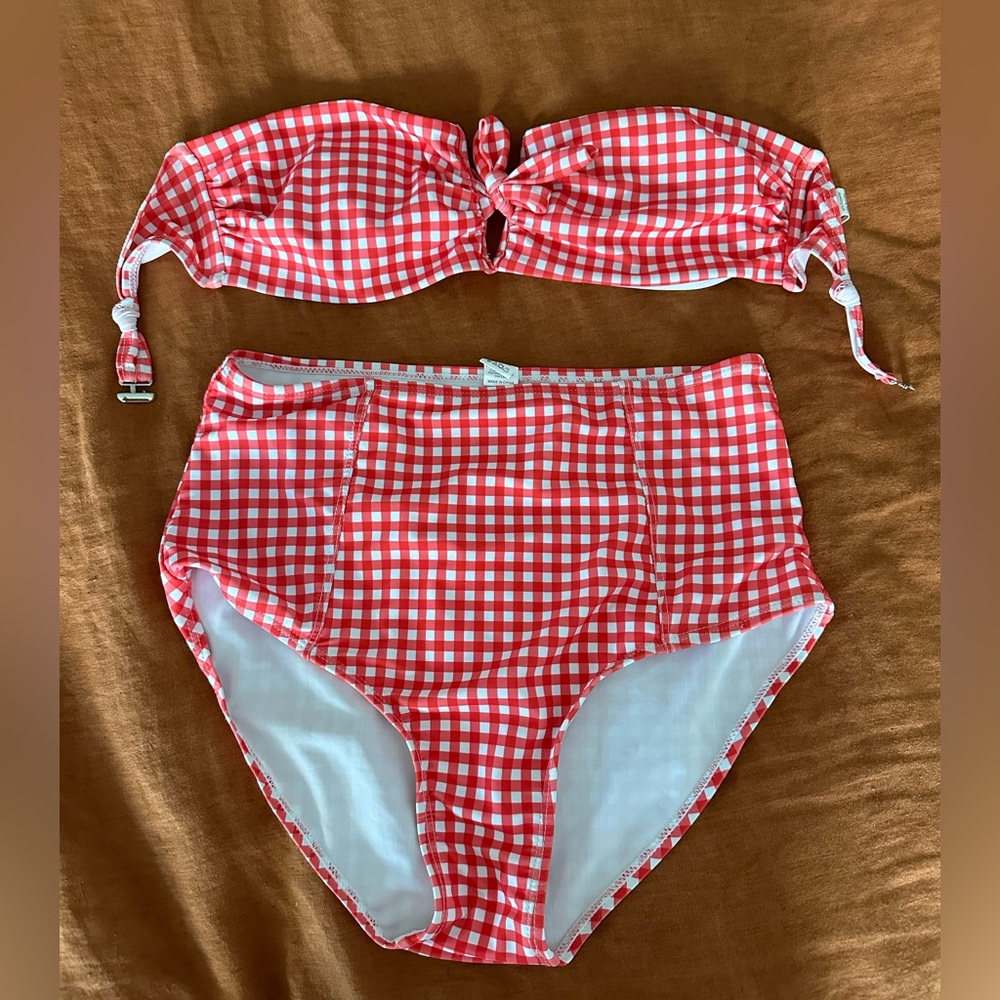 Red and white gingham check two piece swim suit.